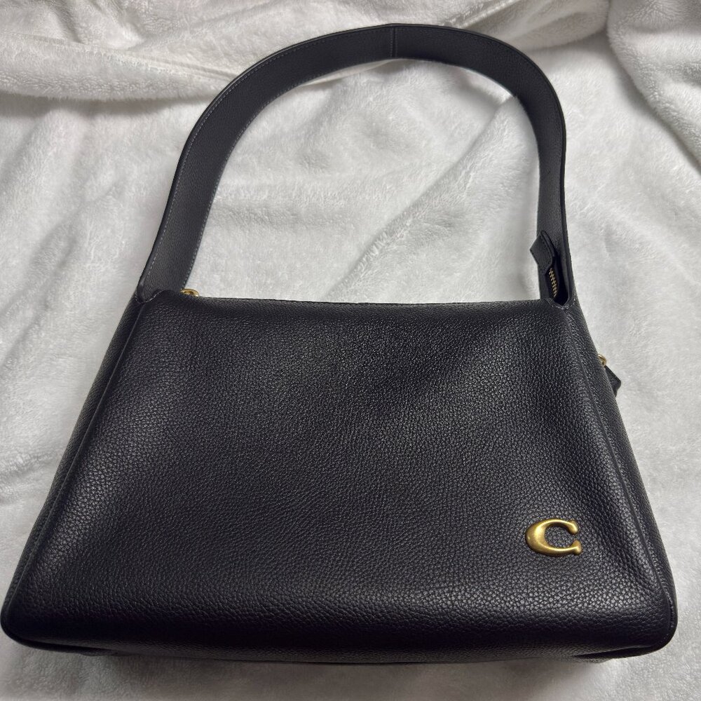 Like new Coach Lola in black pebbled leather